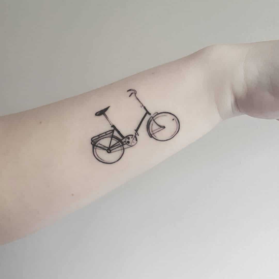 Single needle tandem bike tattoo on the calf. | Bicycle tattoo, Calf tattoos  for women, Tattoos