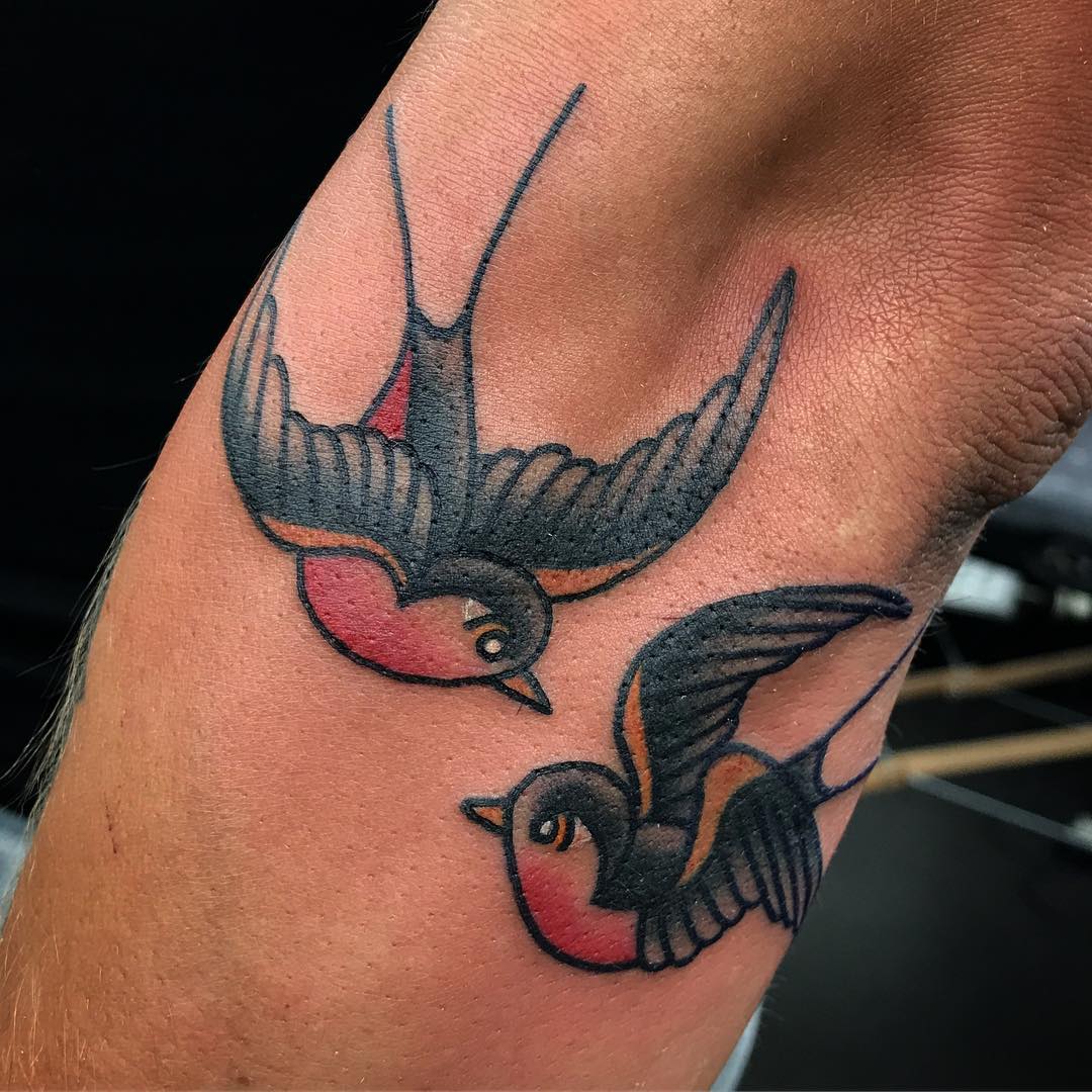 What Does A Swallow Tattoo Symbolize? Loyalty!