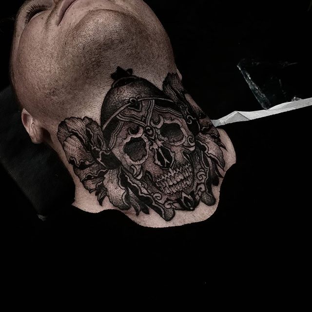 Here is the tibetan skull and peony flower throat tattoo I finished at the @nztattoofestival in newplymouth newzealand it was a tricky one to do but happy with the outcome :) thanks again to everyone that got tattooed by me and special thanks to brent. now off to Japan for 10 days :) . ... studioxiii tattoos ink inked miami artbasel tattooartist tattooart tattoolife inkedup girlswithtattoos inkedgirls bodyart  tattooedgirls tattooing blackwork tatted tatuaje inkedgirl  kingpintattoosupply
