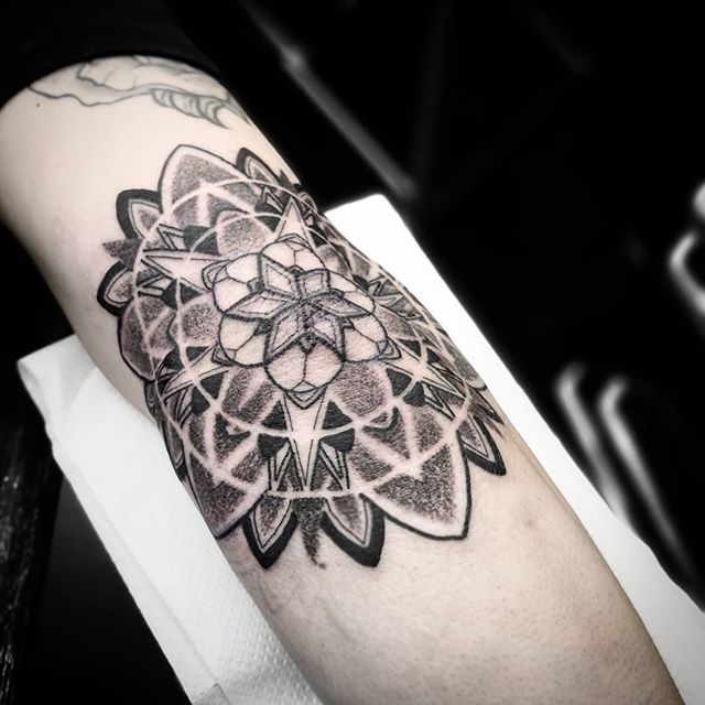 Black Ink Mandala Tattoo On Elbow