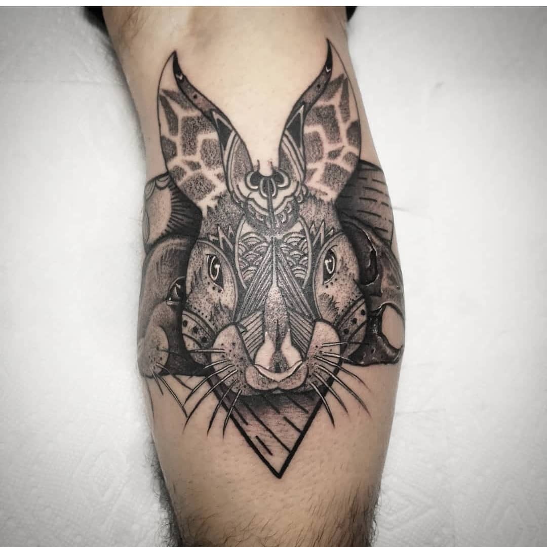 well - detailed tattoo stencil of a baby bunny, bold | Stable Diffusion