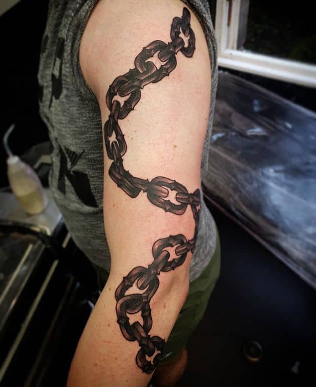 Sunset Tattoo — Blackwork Chain Tattoo by Roger Moore...