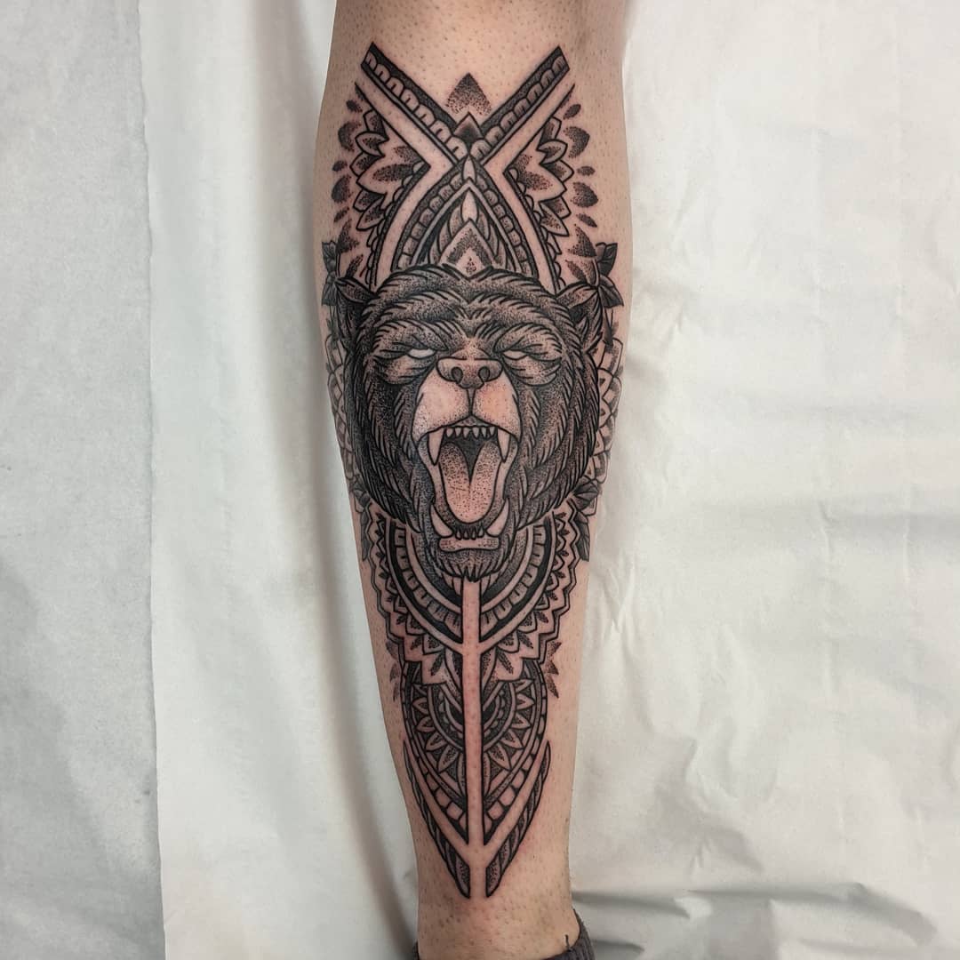 Lion head maori tattoo style